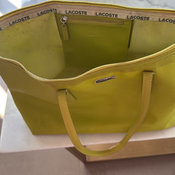 Lacoste bag with zipper and pick inside . Great condition and beautiful color . - Picture 2 of 3